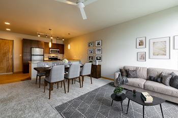 Karndean wood floors entry to kitchen and carpeted living spaces and bedrooms